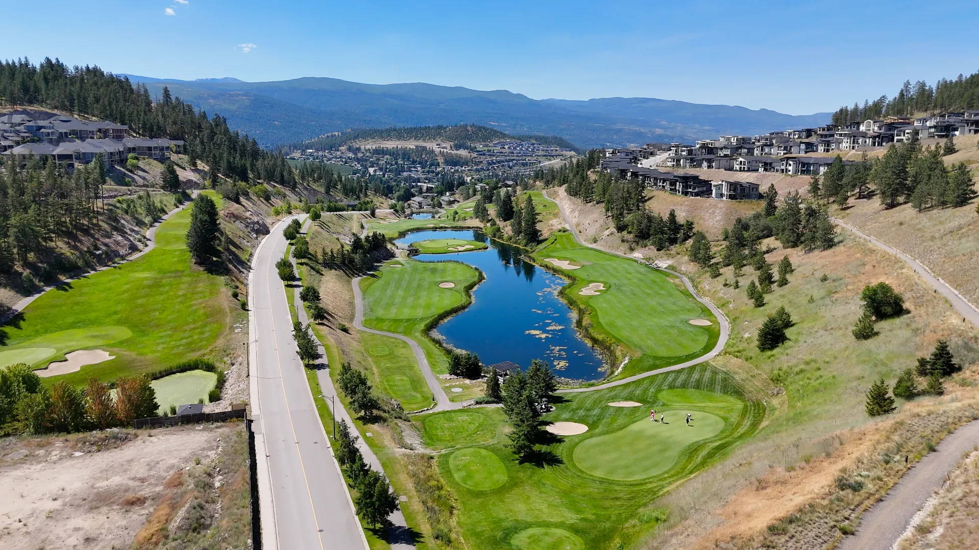 Aerial view of Black Mountain Golf Club and hillside homes in Black Mountain, Kelowna, British Columbia